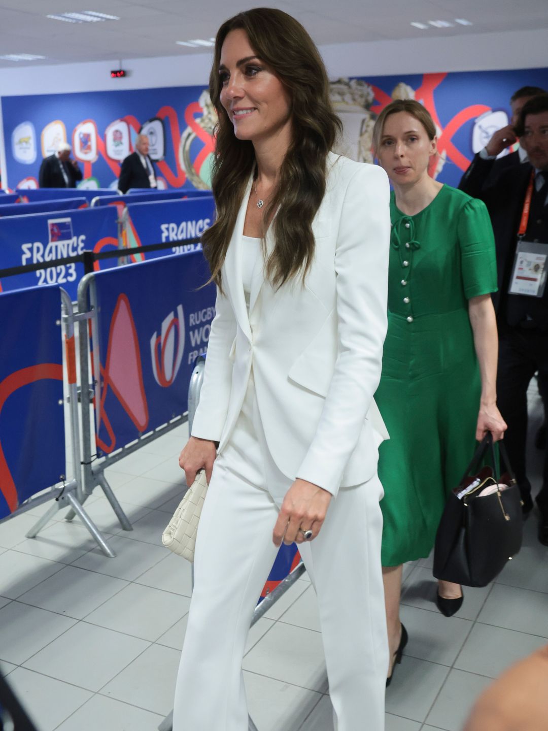 Princess Kate wearing a clean white suit 