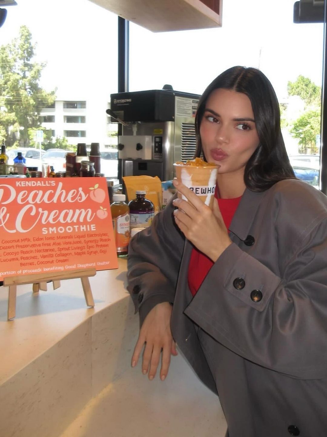 Kendall Jenner poses with her Erewhon smoothie 