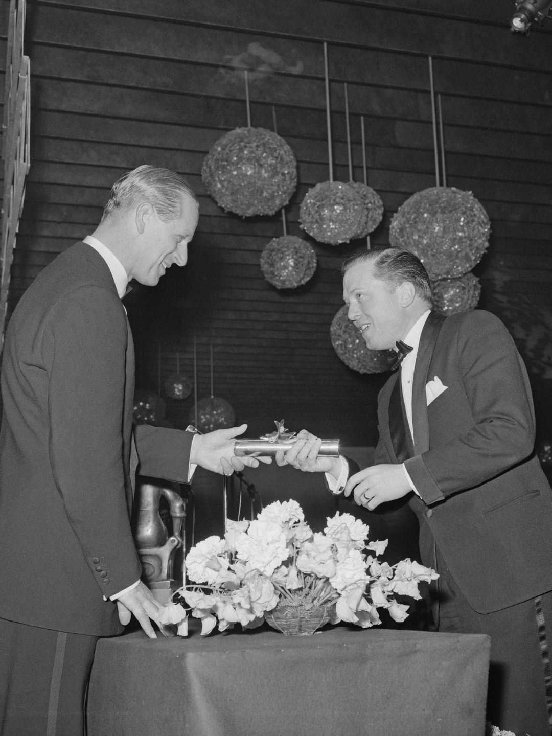 Prince Philip presents an award to British actor and producer Richard Attenborough at the 16th British Academy Film Awards in London on 8th May 1963. Richard Attenborough co-produced the film 'The L-Shaped Room', one of the nominees for Best Film at the Awards.