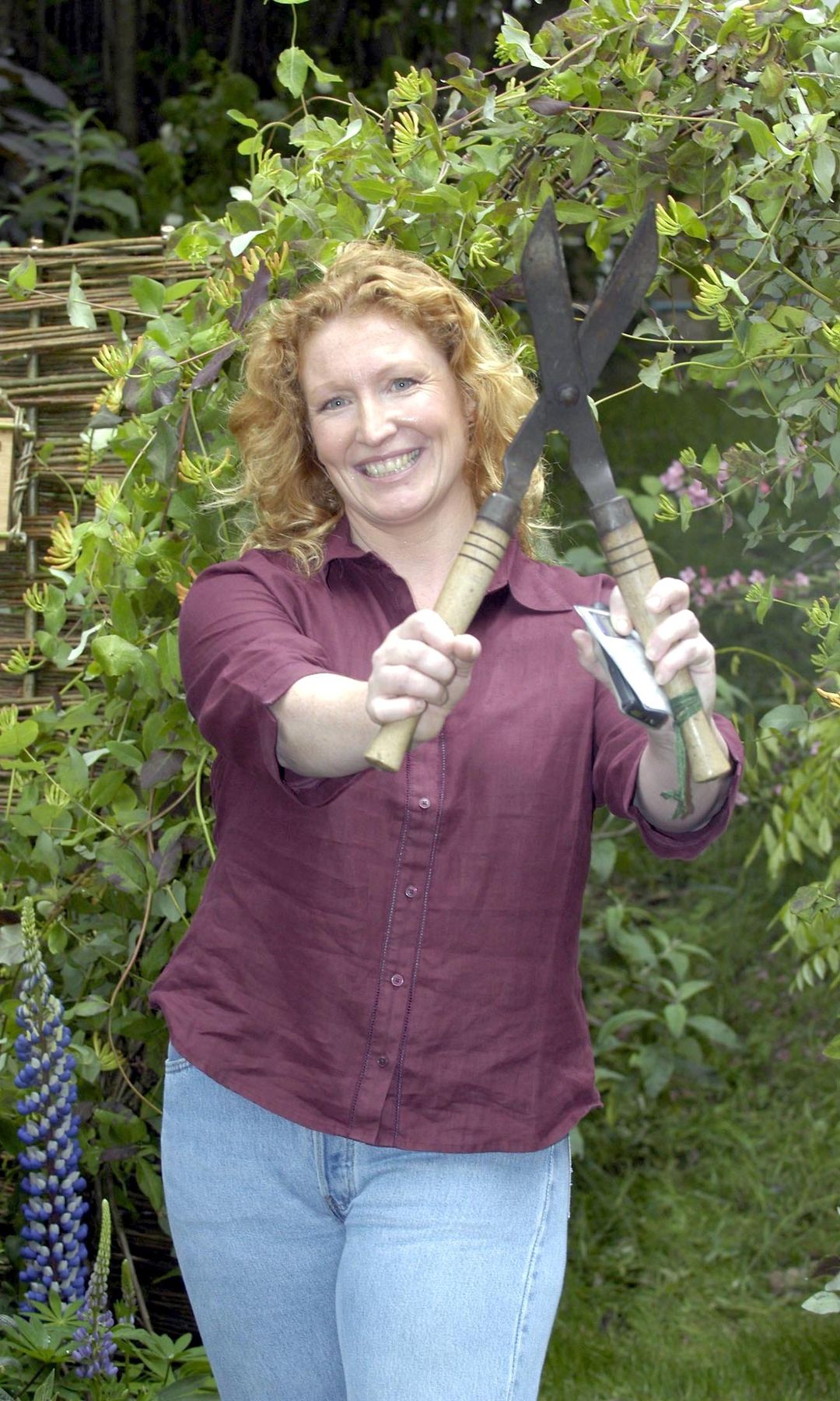 Charlie Dimmock holding a pair of shears