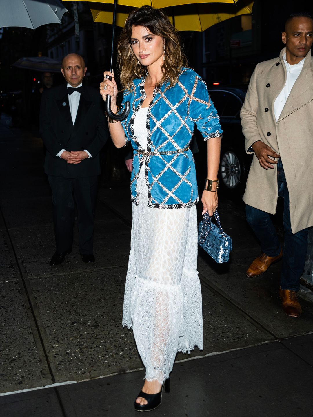 Penélope Cruz topped things off with a blue sequin Chanel monogram bag 