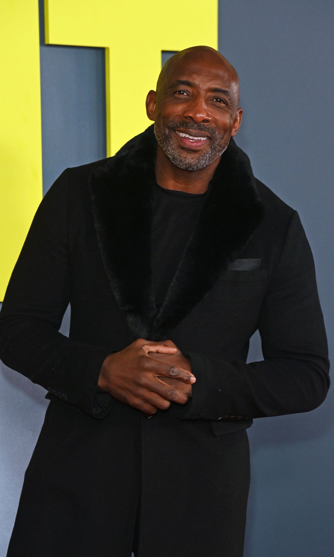 Johnny Nelson in a black coat