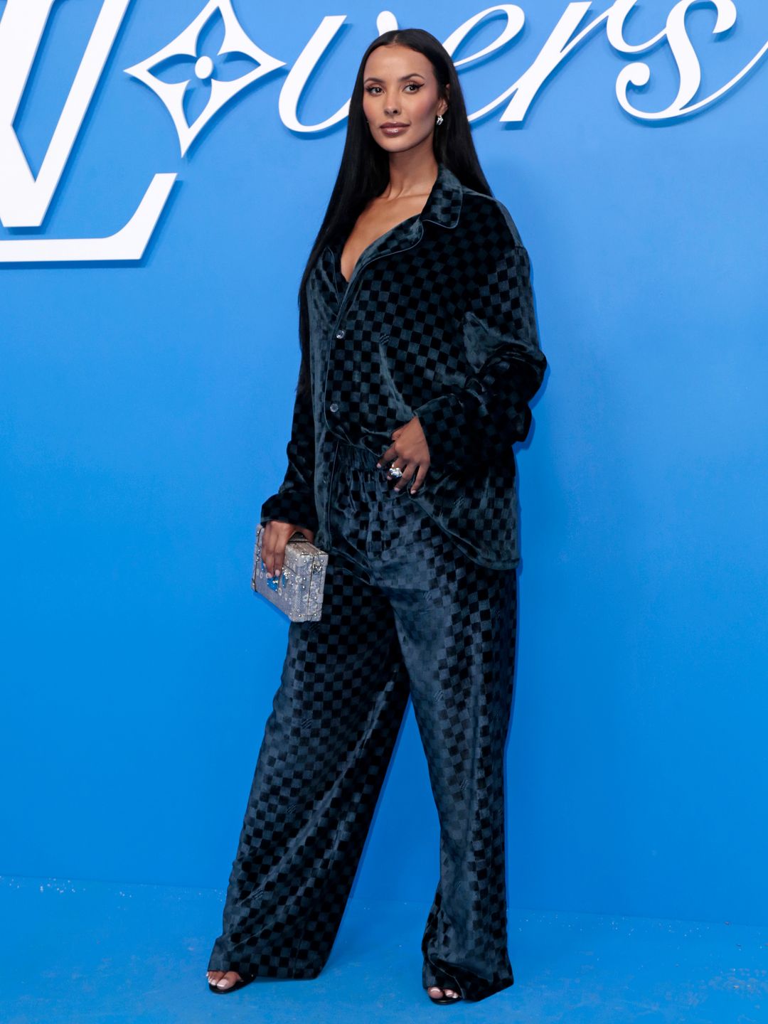 Maya Jama attends the Louis Vuitton Menswear Spring/Summer 2025 show as part of Paris Fashion Week on June 18 in a matching velvet suit