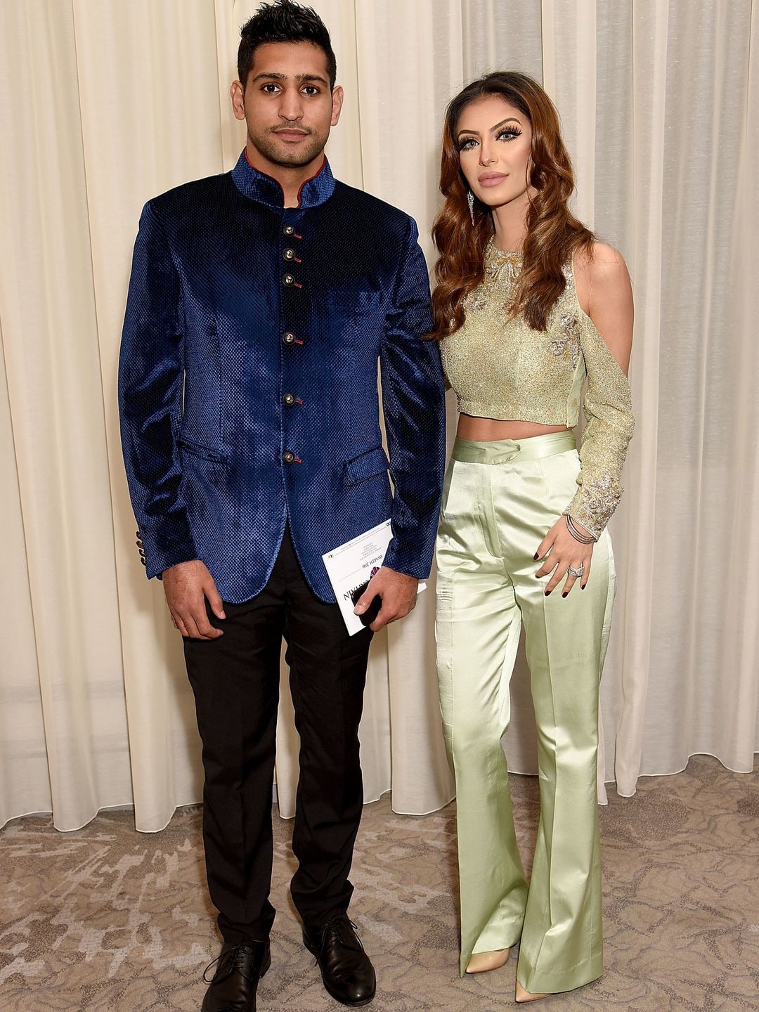 Amir Khan in a velvet blue jacket and Faryal in a green co-ord at the Pride of Britain Awards