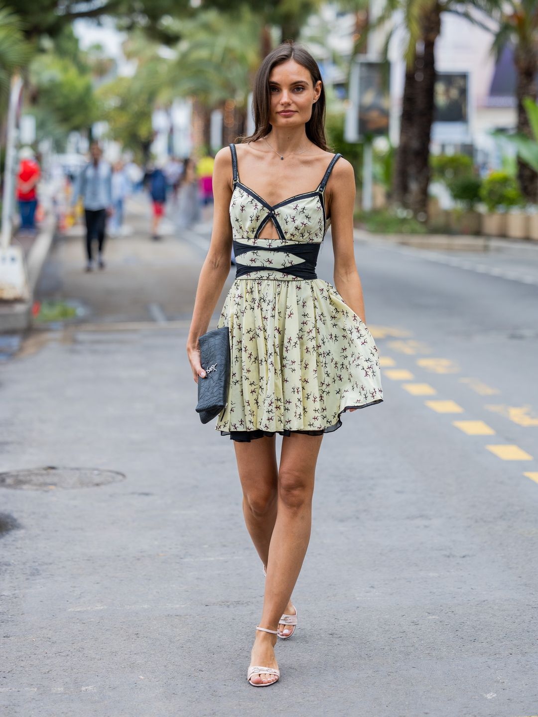 Tina Lezhe looked elegant in a floral mini dress