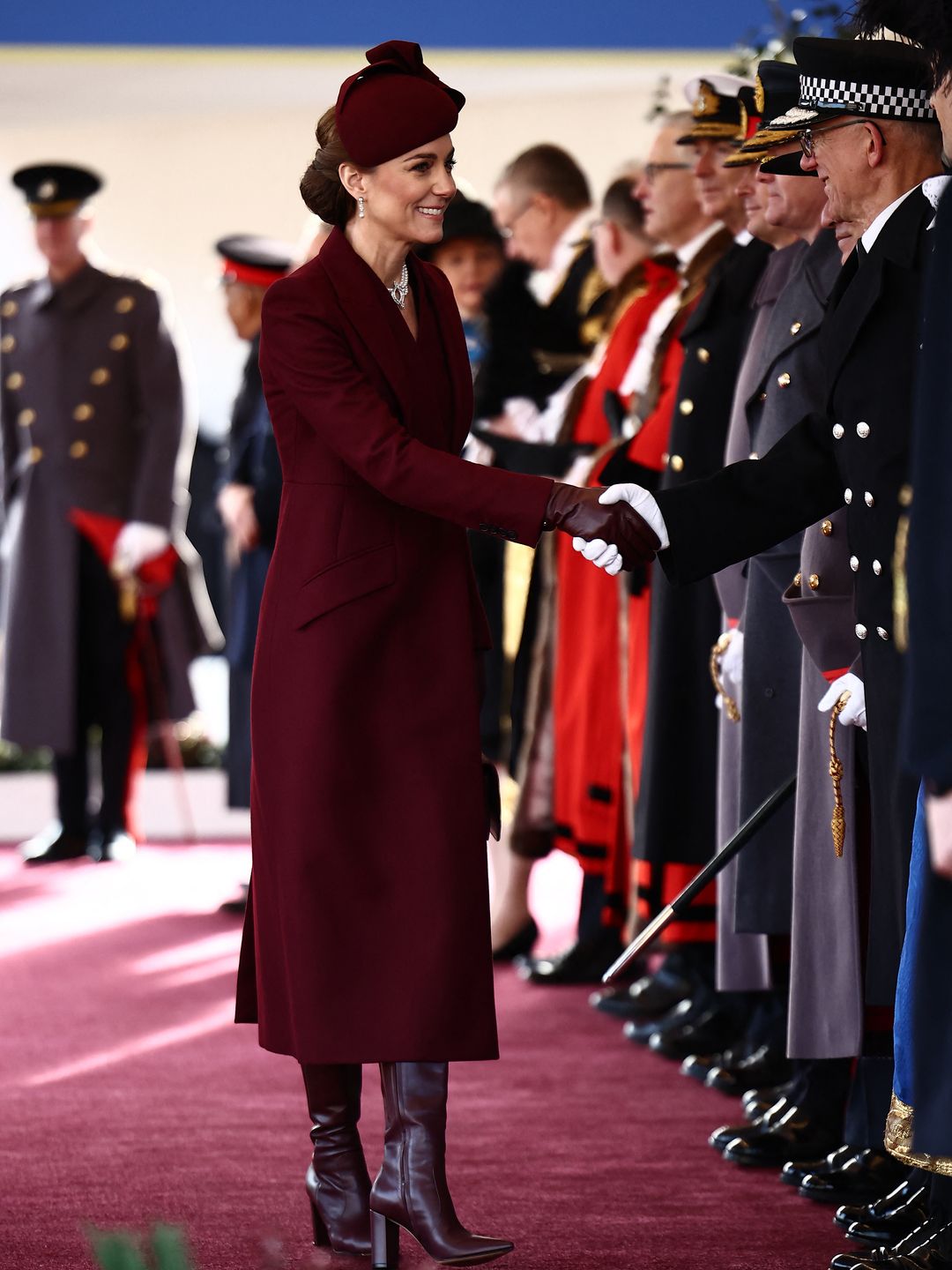 Britain's Catherine, Princess of Wales greets dignitaries as she arrives ahead of a Ceremonial Welcome for the Emir of Qatar at Horse Guards Parade in London on December 3, 2024,