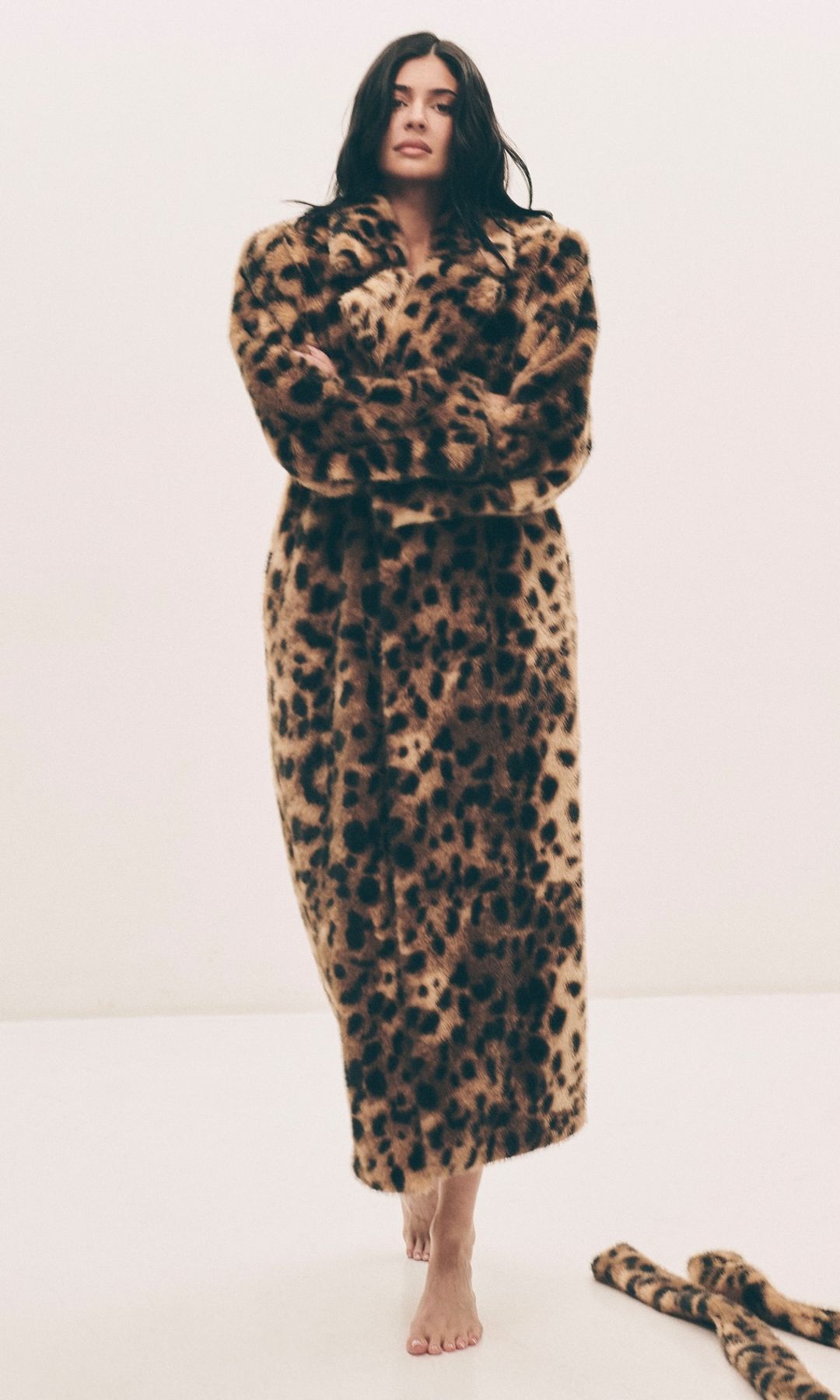 Kylie Jenner poses in an animal print faux fur coat