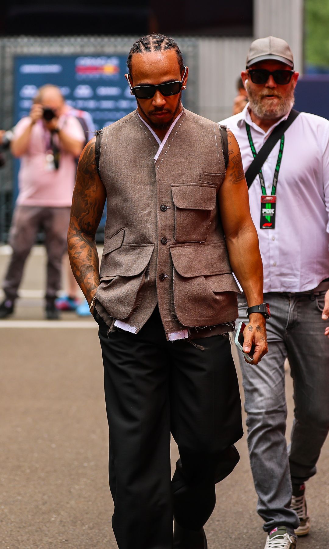 Lewis Hamilton of Great Britain and Ferrari walks in the paddock catching the attention of the media during qualifying ahead of the F1 Grand Prix of Austria at Red Bull Ring on June 28, 2025 in Spielberg, Austria. (Photo by Kym Illman/Getty Images)