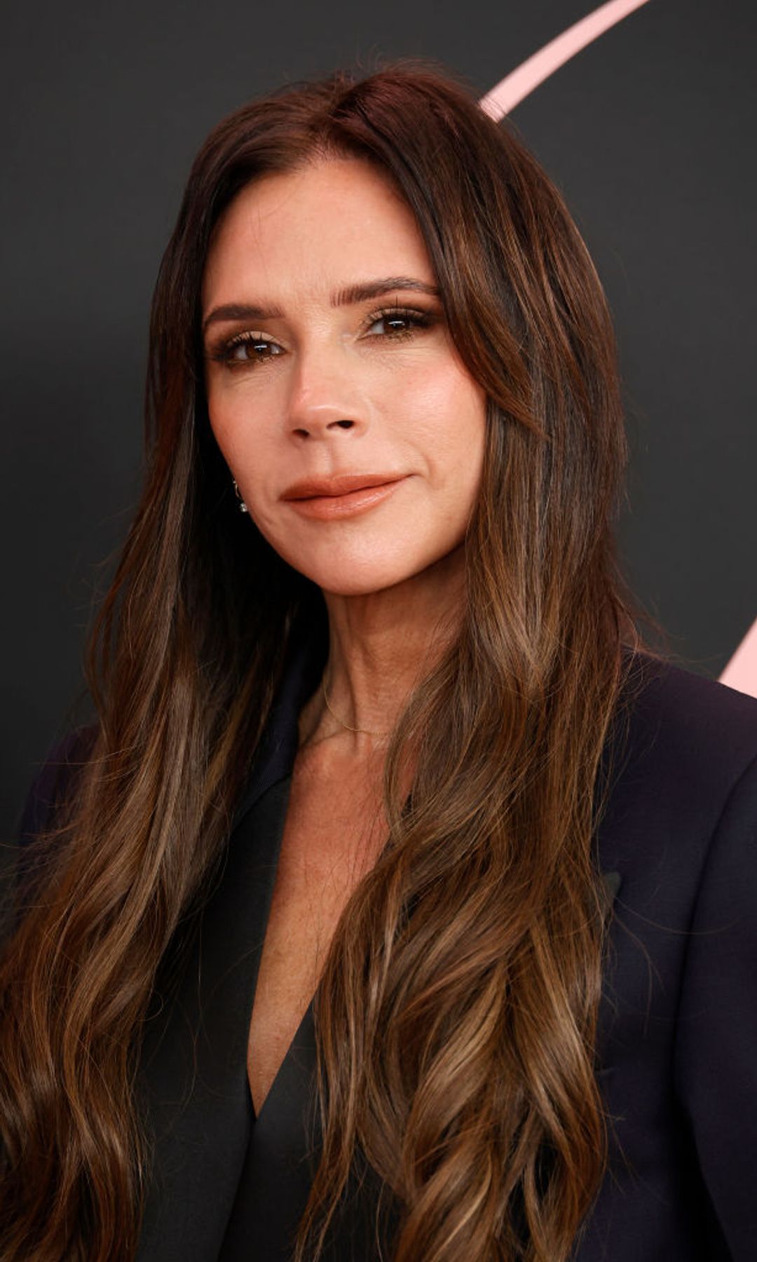 victoria beckham effortless long chestnut hair and natural glam 