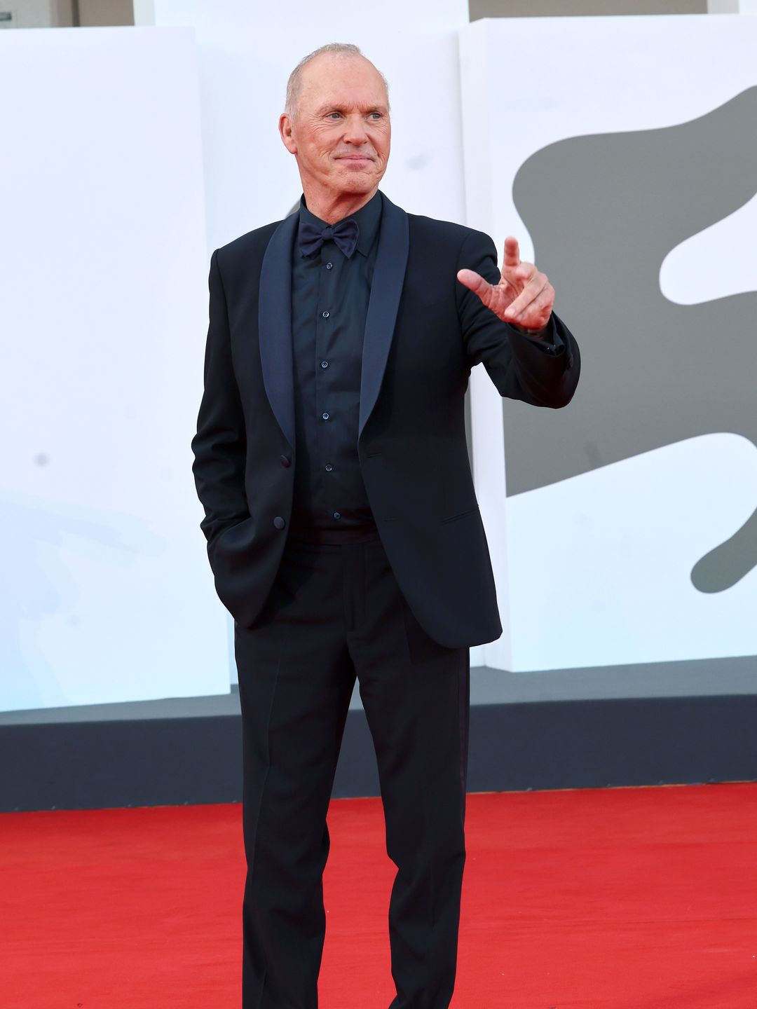 Michael Keaton in a black suit