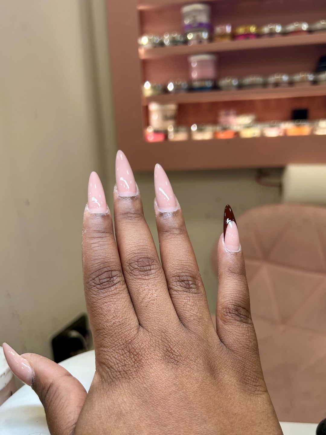 The brown french tip inspired lines. 