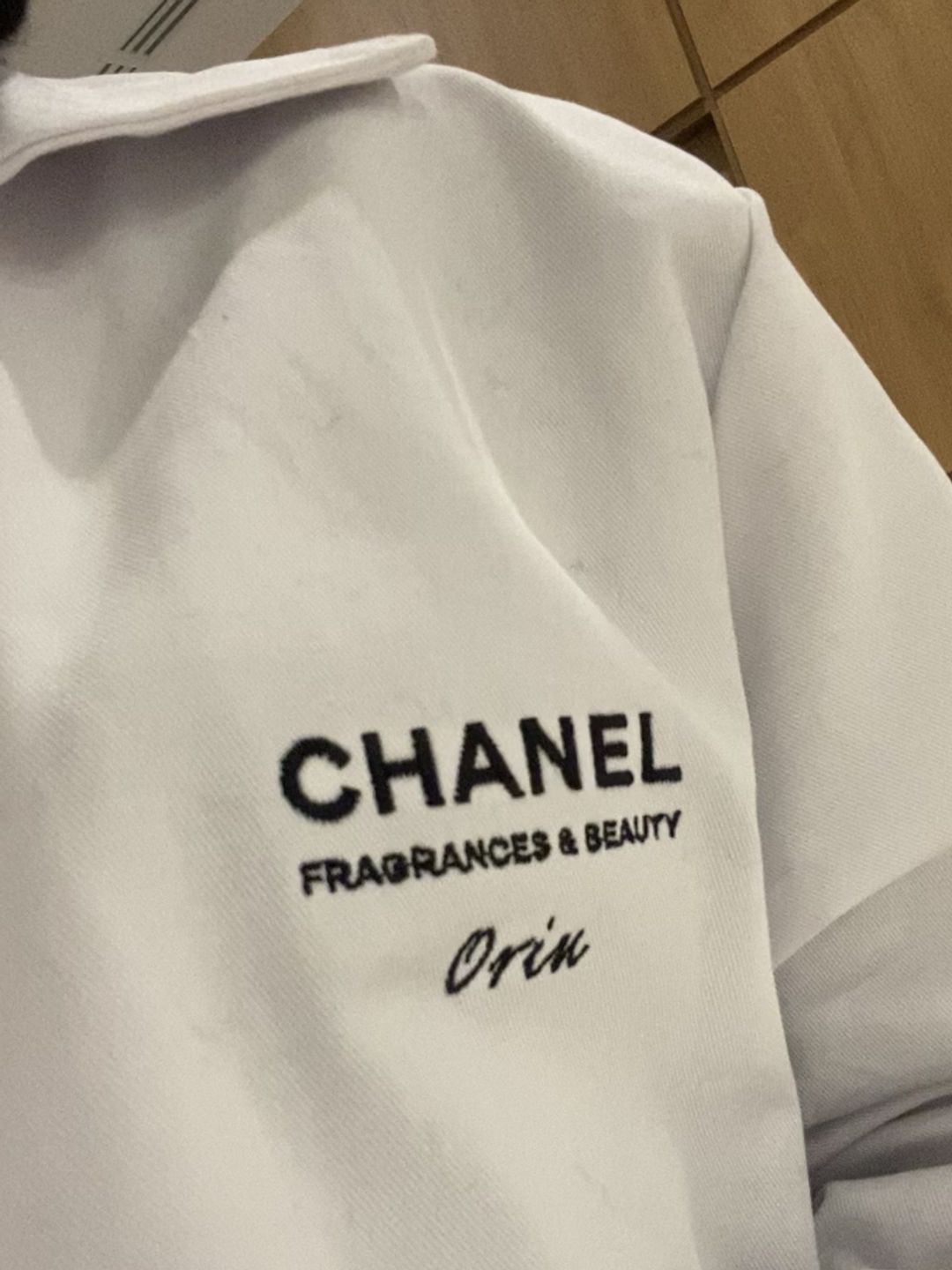 Close-up of Chanel lab coat embroidery 