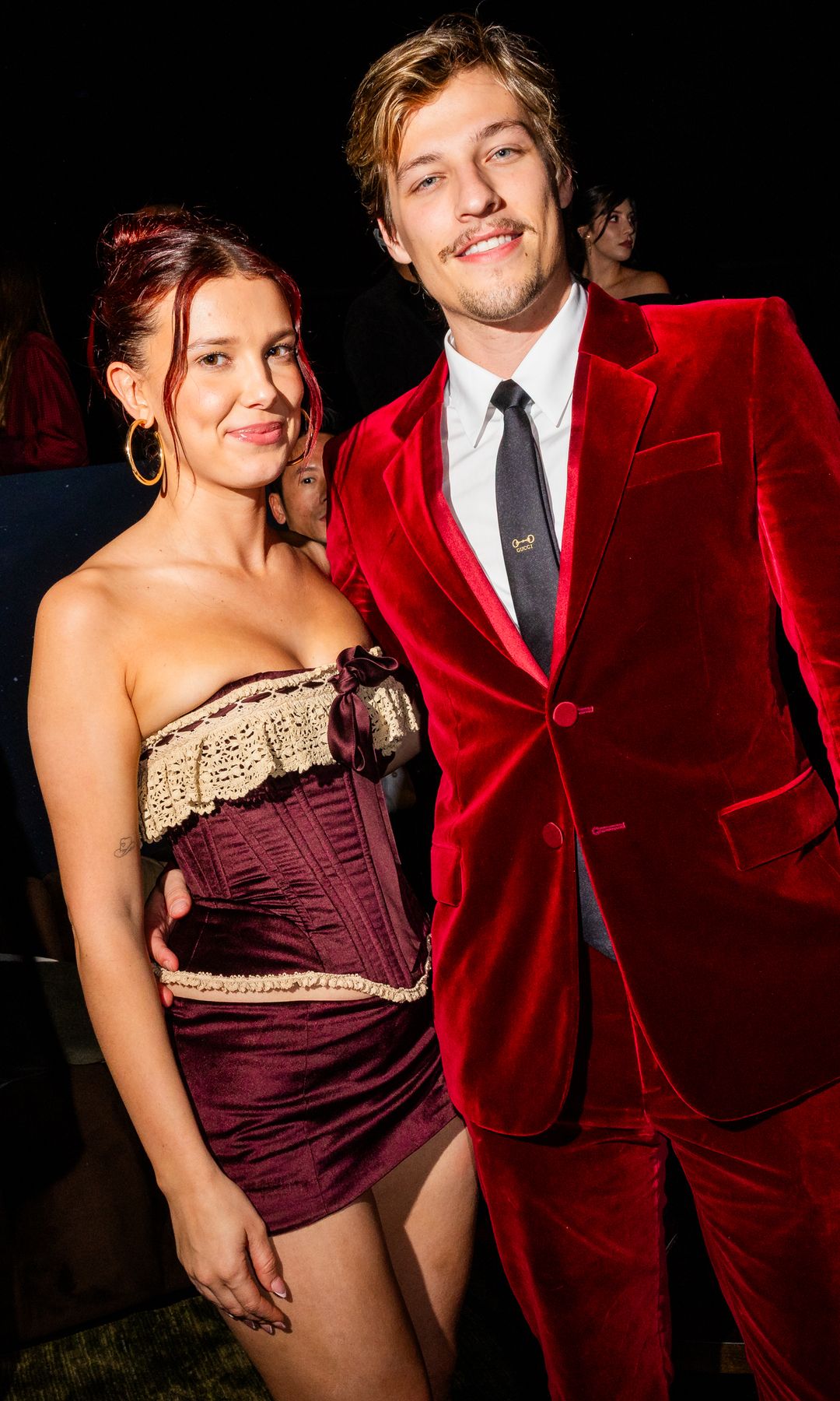 Millie Bobby Brown and Jake Bongiovi attend Netflix's "Stranger Things" Season 5 World Premiere at TCL Chinese 6 Theatres on November 06, 2025 in Hollywood, California.