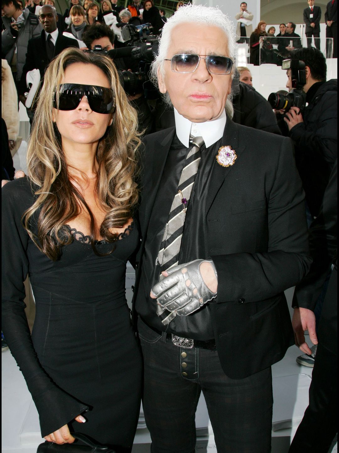 FRANCE - JANUARY 24:  Celebs At Chanel Spring-Summer 2006 Hc Fashion Show In Paris - On January 24Th, 2006 - In Paris, France - Here, Victoria Beckham And Karl Lagerfeld  (Photo by Serge BENHAMOU/Gamma-Rapho via Getty Images)