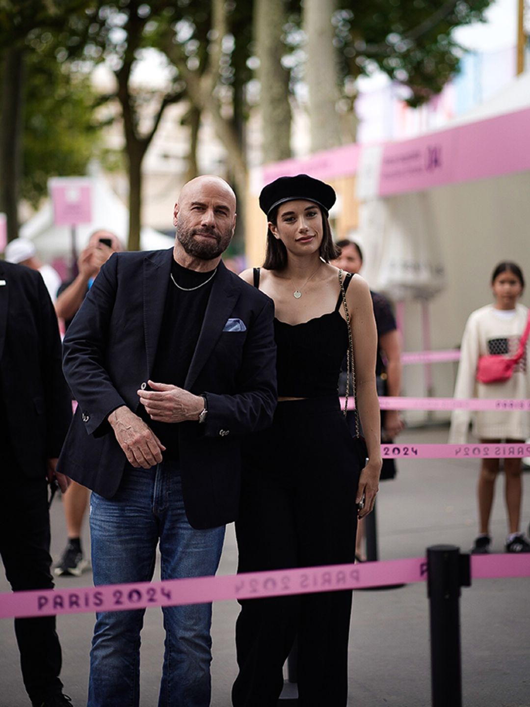 Ella and John Travolta arriving at the Paris Olympics