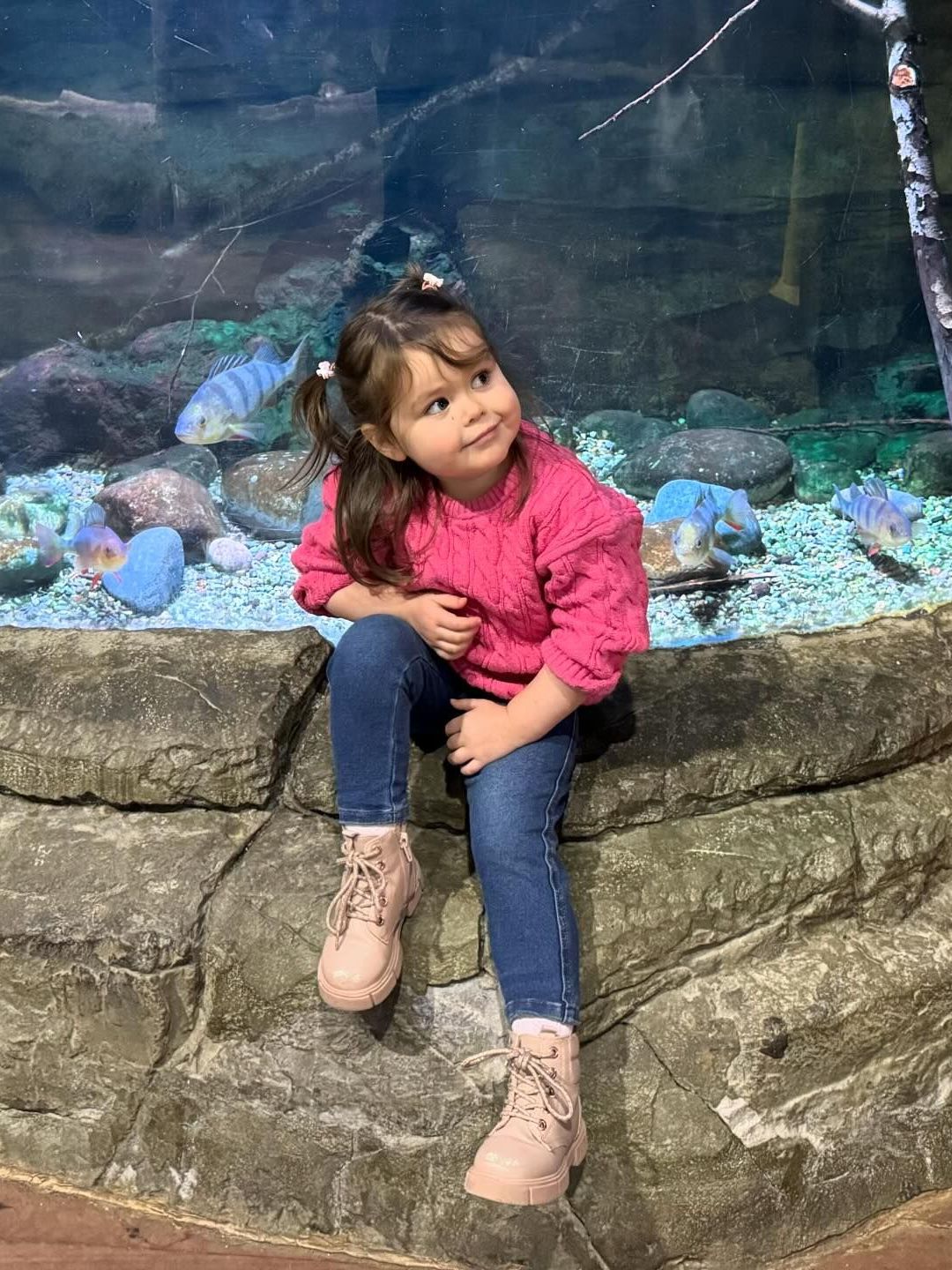 young girl in aquarium 