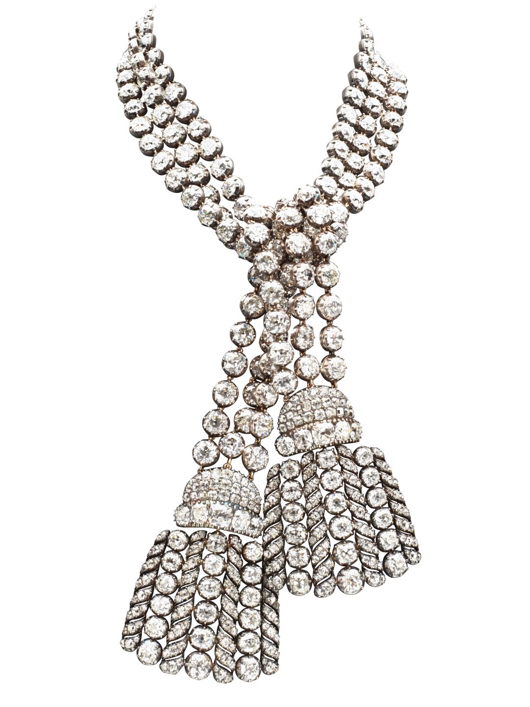 An elaborate diamond necklace from the 18th century, featuring a double-strand design of closely set round diamonds, culminating in two intricate tassels made of layered diamonds. This piece exudes regal luxury. The necklace is linked to Marie-Antoinette's 'Affair of the Necklace'