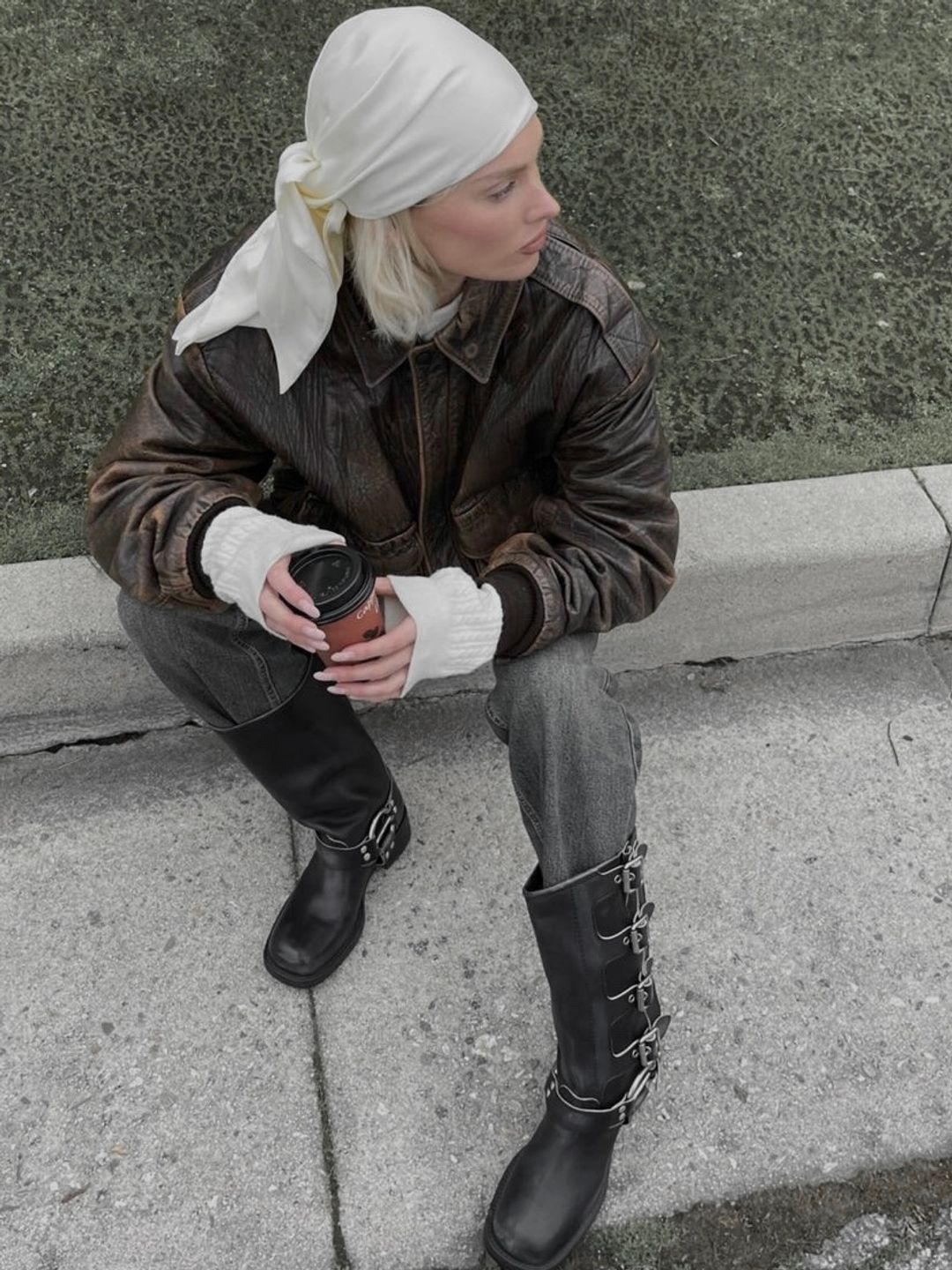 Elsa Hosk styled her Miu Miu Sienna biker boots with a white bandana