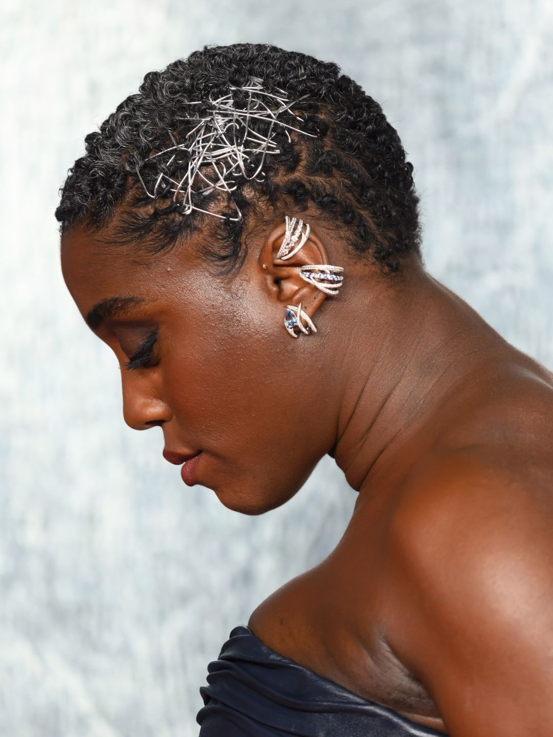 A side view of Lashana's hair at The Day of the Jackal premiere 