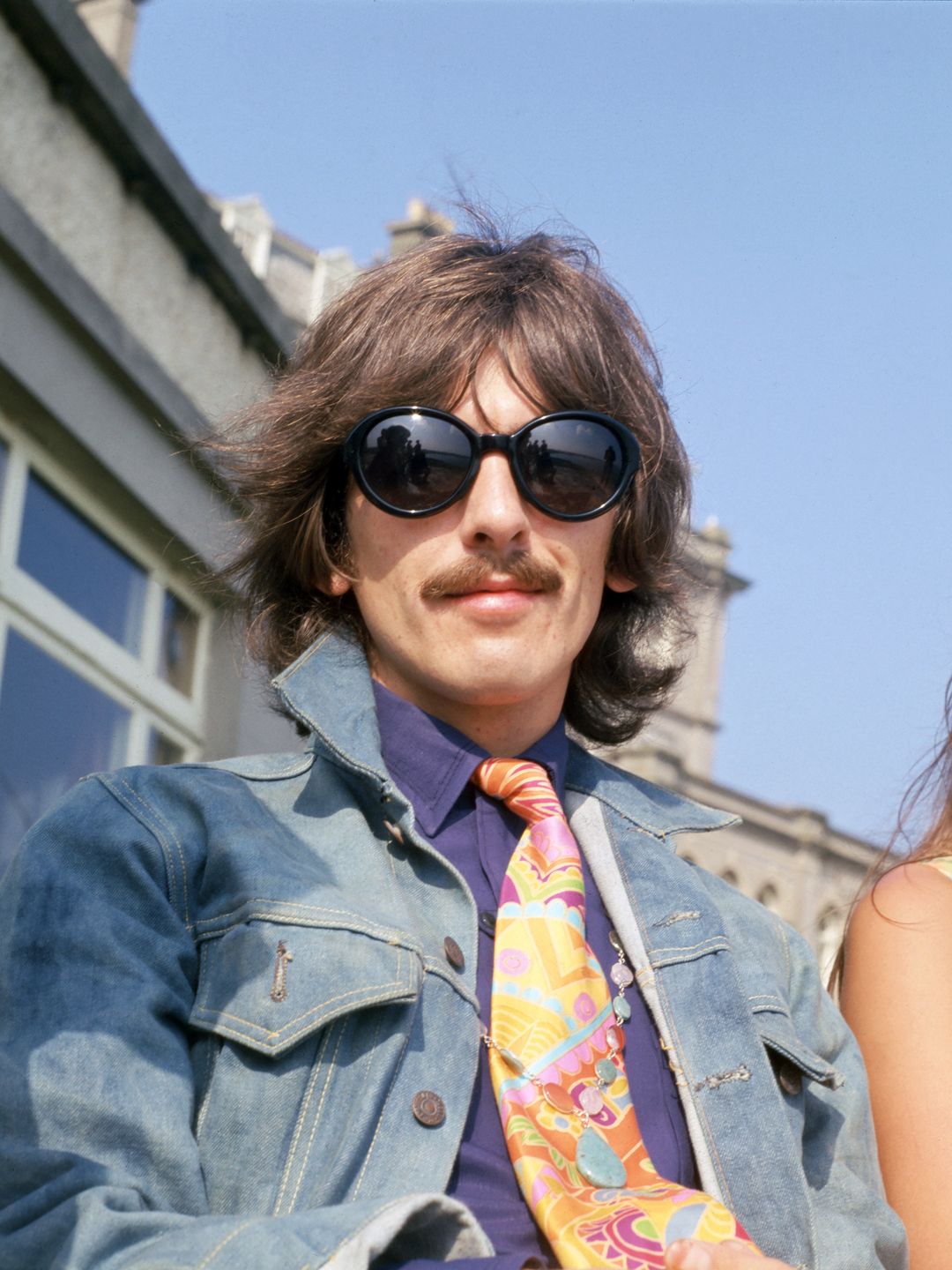 George Harrison: Harrison’s thick, neatly trimmed mustache complemented his rocker style, often paired with long hair and colorful attire. His mustache embodied the 1970s counterculture and became part of his distinctive, rebellious image.