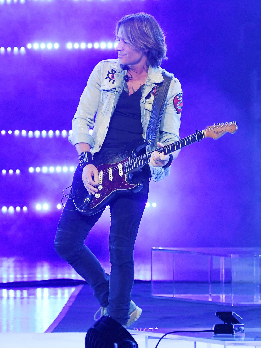 Keith Urban on stage with a guitar