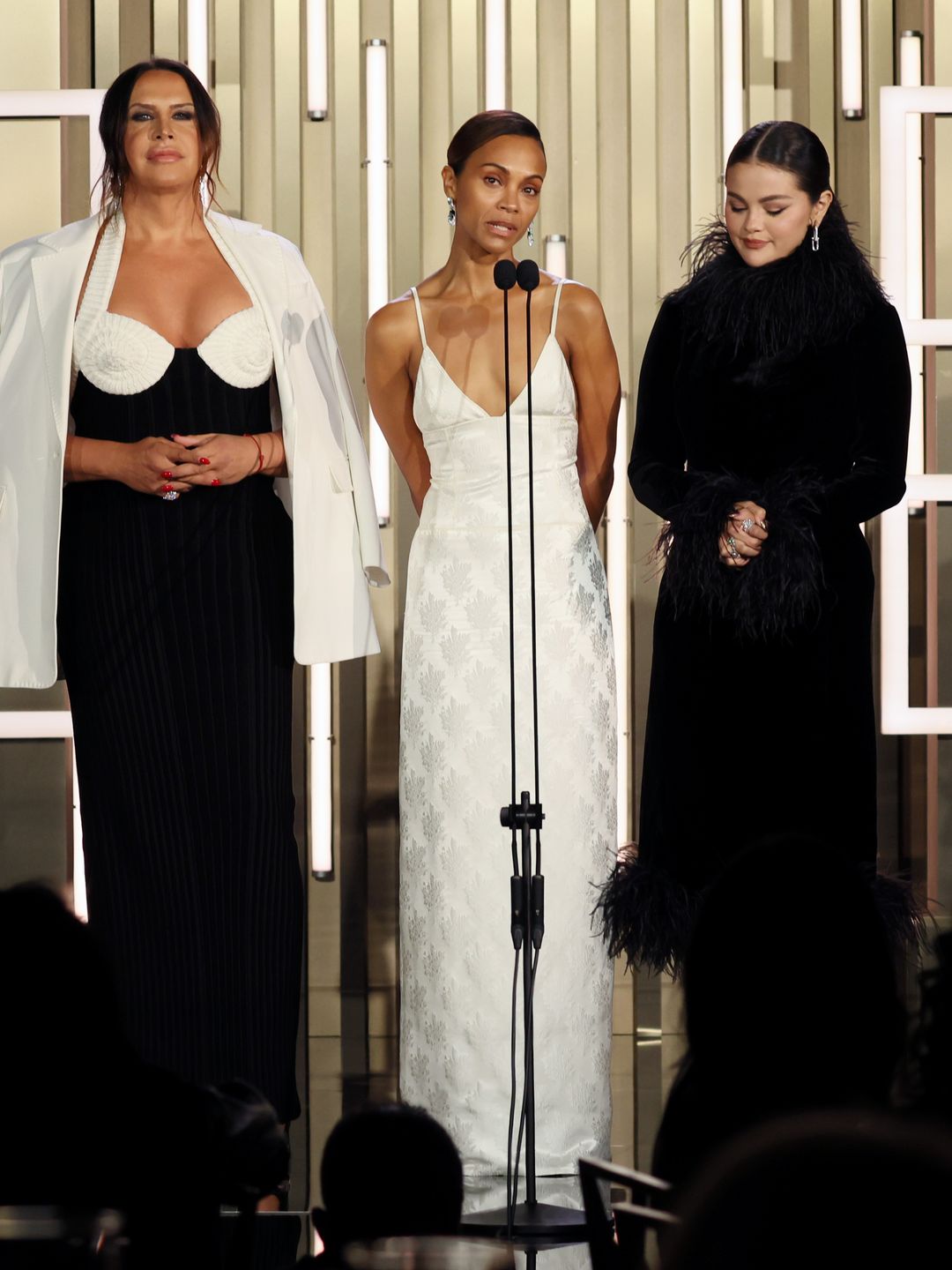 Karla Sofia Gascon,  Zoe Saldana, and Selena Gomez speak onstage during the TIFF Tribute Awards during the 2024 Toronto International Film Festival at Fairmont Royal York on September 08, 2024 in Toronto, Ontario. (Photo by Jemal Countess/Getty Images)