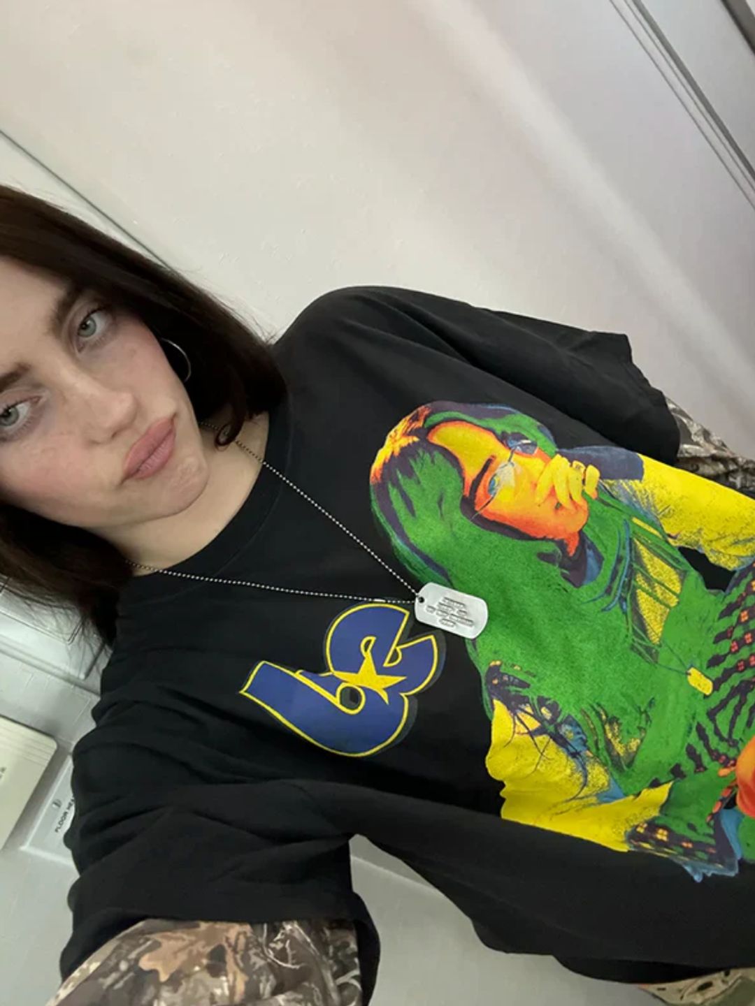 Billie championed her own merchandise in an XL graphic T-shirt