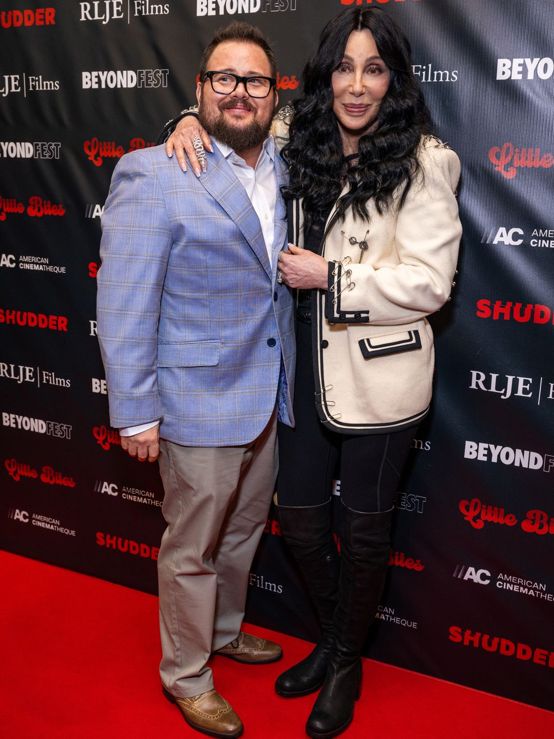 Chaz Bono and Cher at a premiere