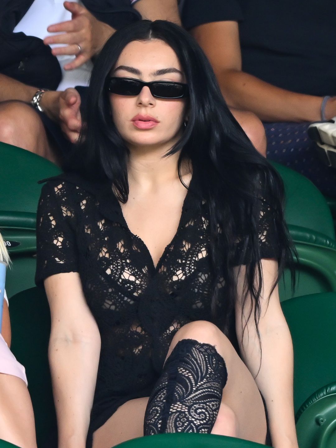 Charli XCX court-side of Centre Court on day eleven of the Wimbledon Tennis Championships at the All England Lawn Tennis and Croquet Club on July 11, 2024 in London, England.