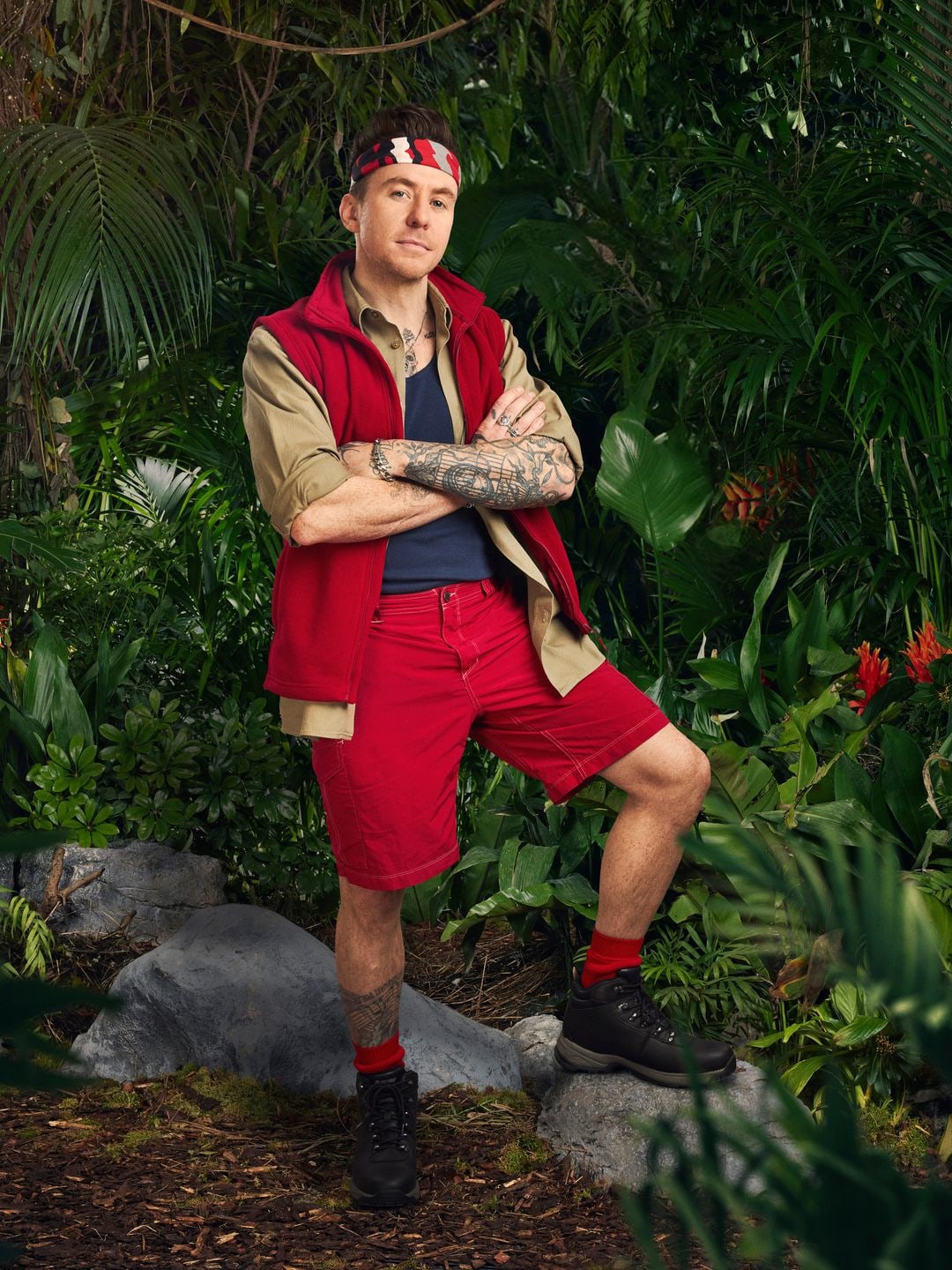 i'm a celeb contestant in red outfit 