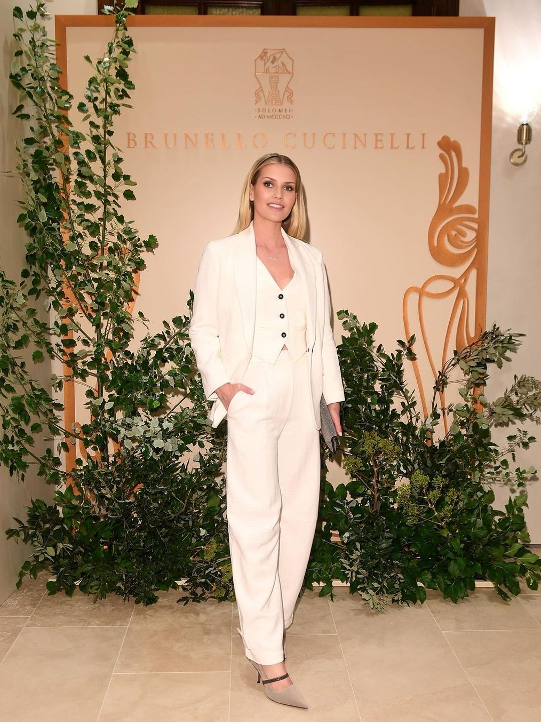 Lady Kitty Spencer wearing a three-piece suit by Brunello Cucinelli 