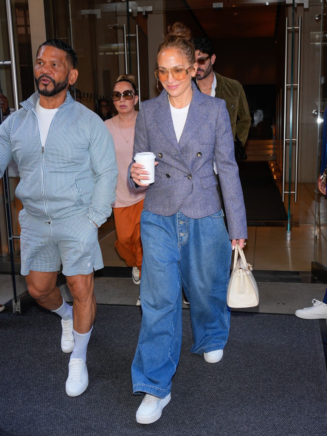 Jennifer Lopez harkened back to her signature Y2K style in a double denim look