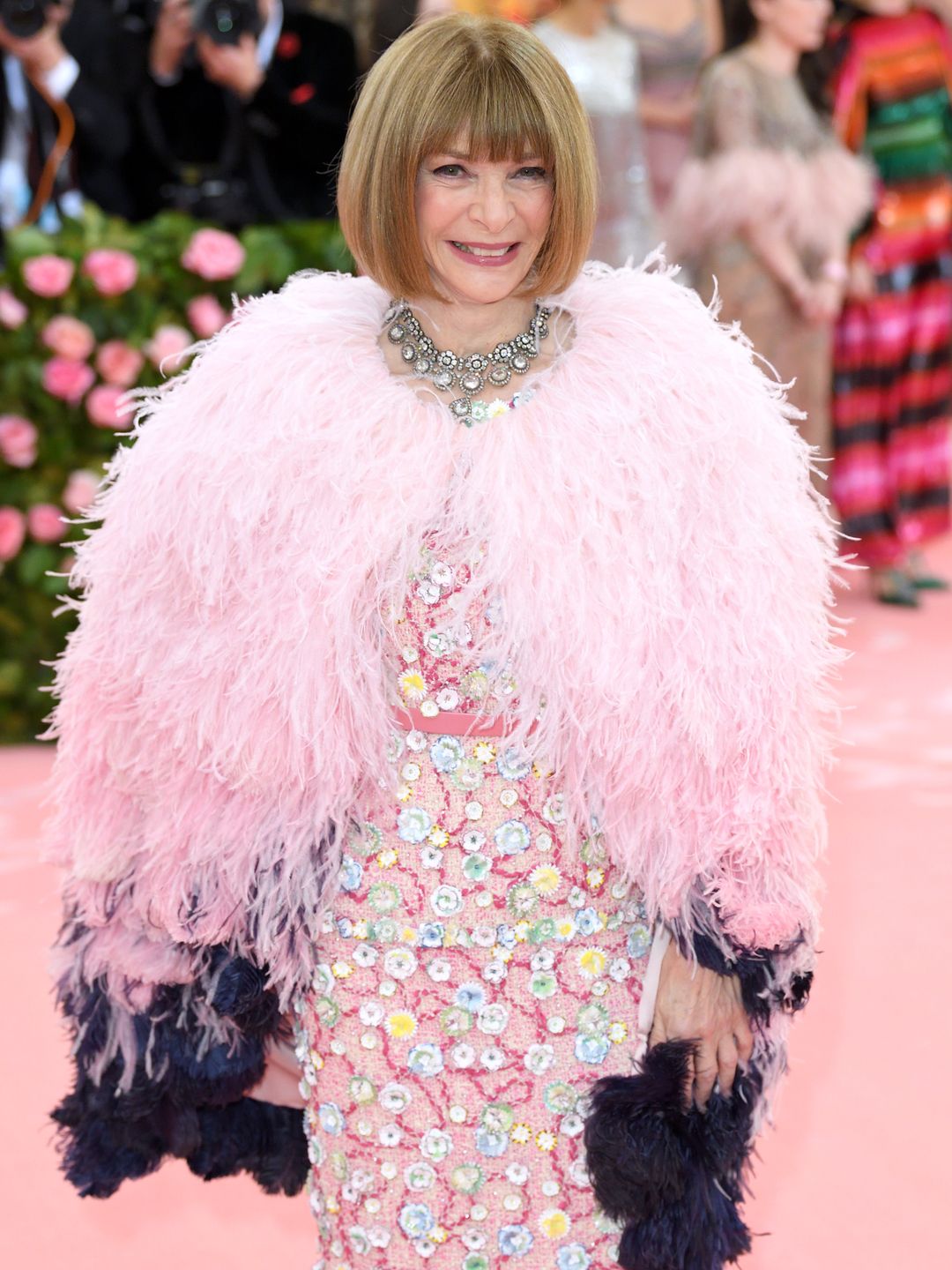 anna wintour in pink ostrich cape