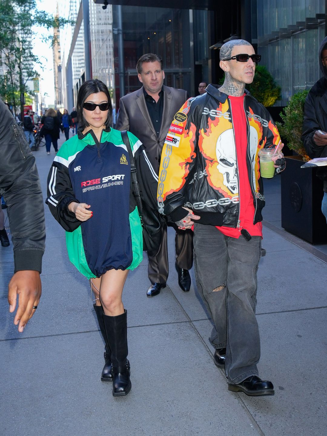 Kourtney Kardashian and Travis Barker holing hands on the streets of New York 