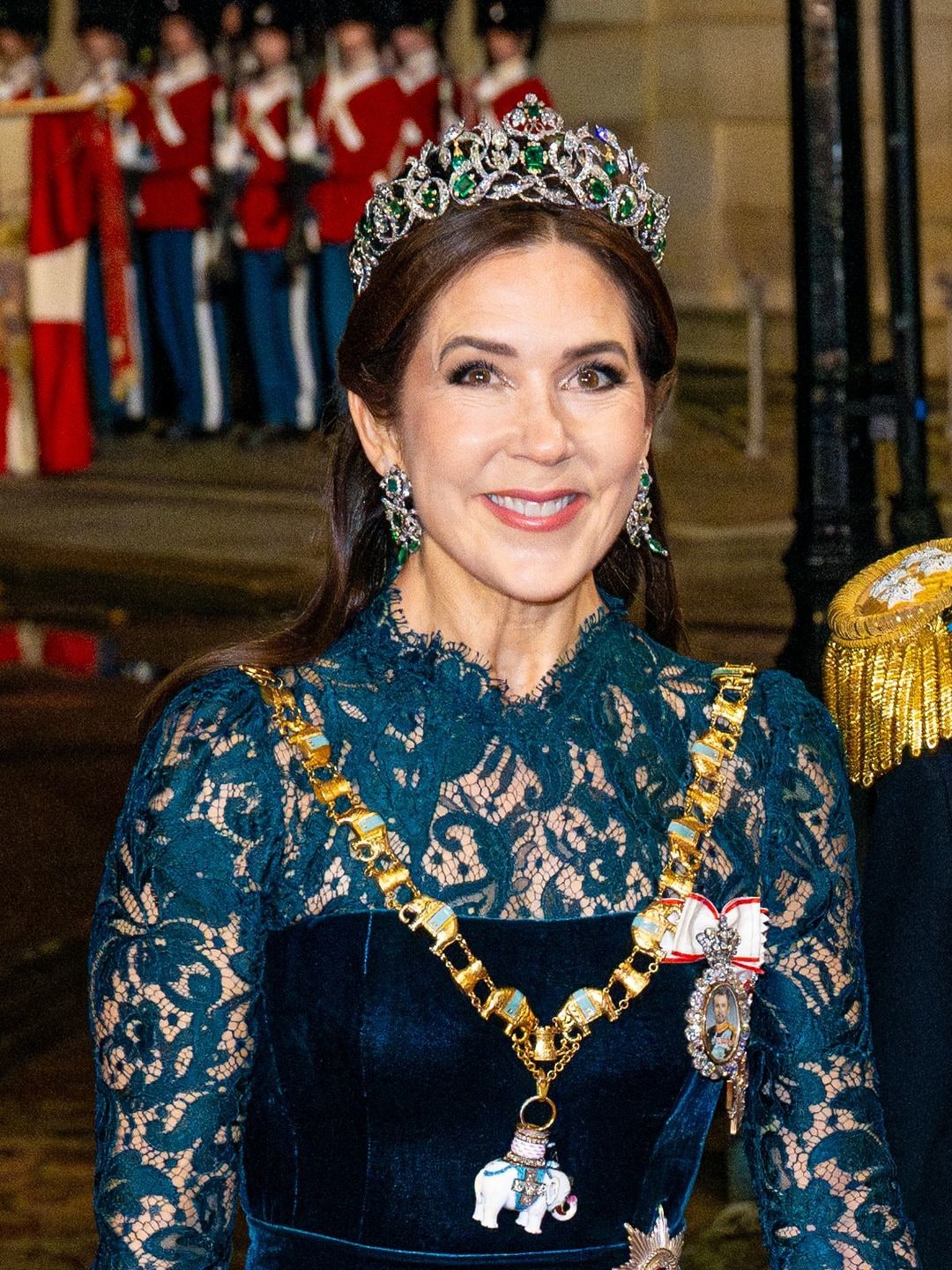 danish royal lady in green velvet dress and tiara