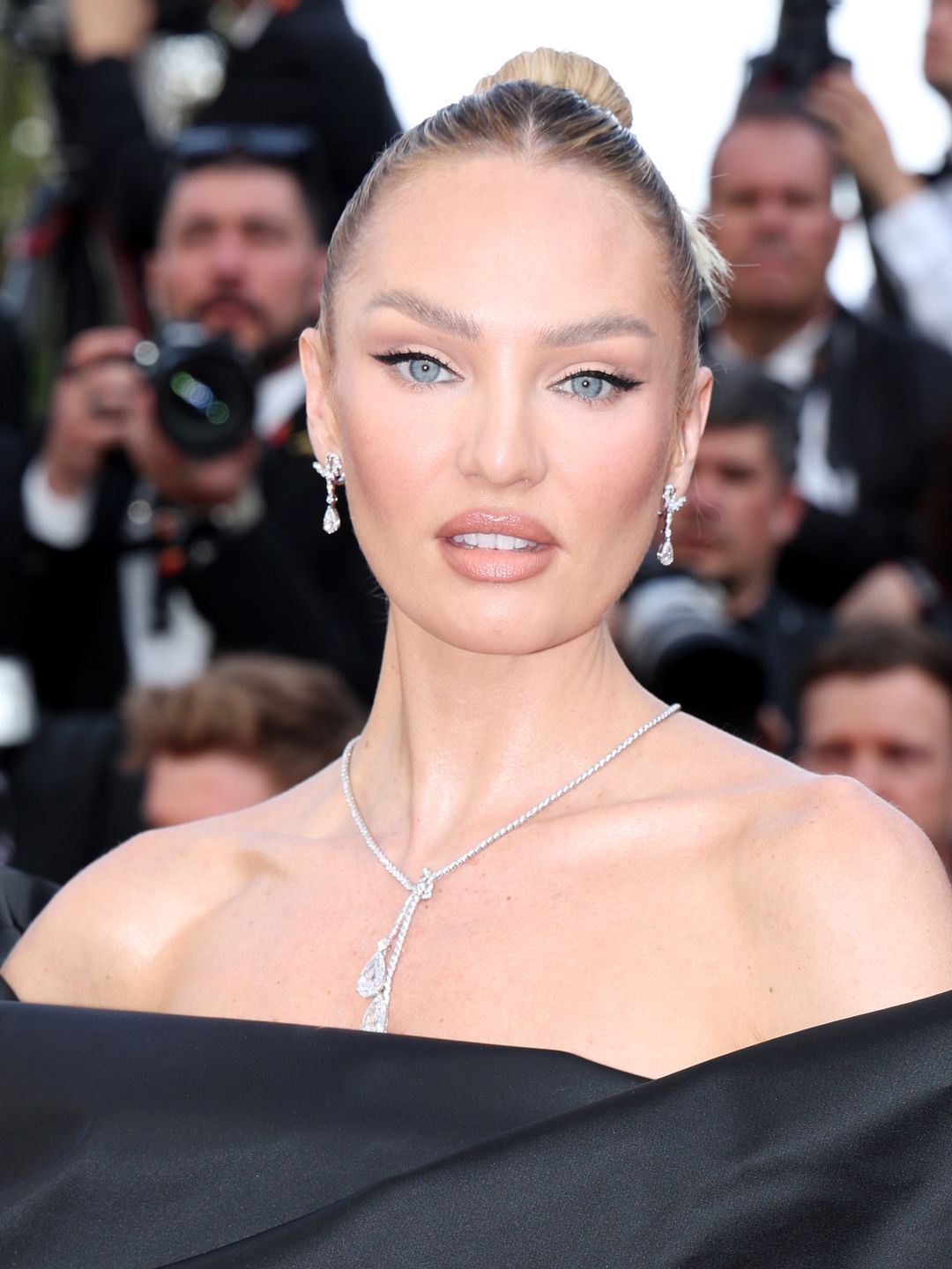 Candice Swanepoel in a black off-the-shoulder gown at Cannes 