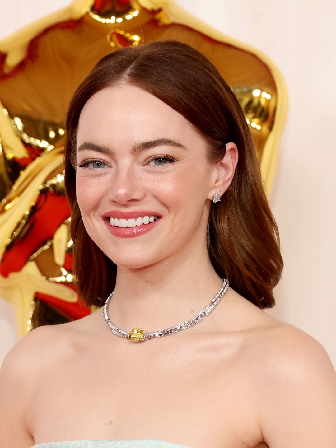 Emma Stone smiling at the Oscars