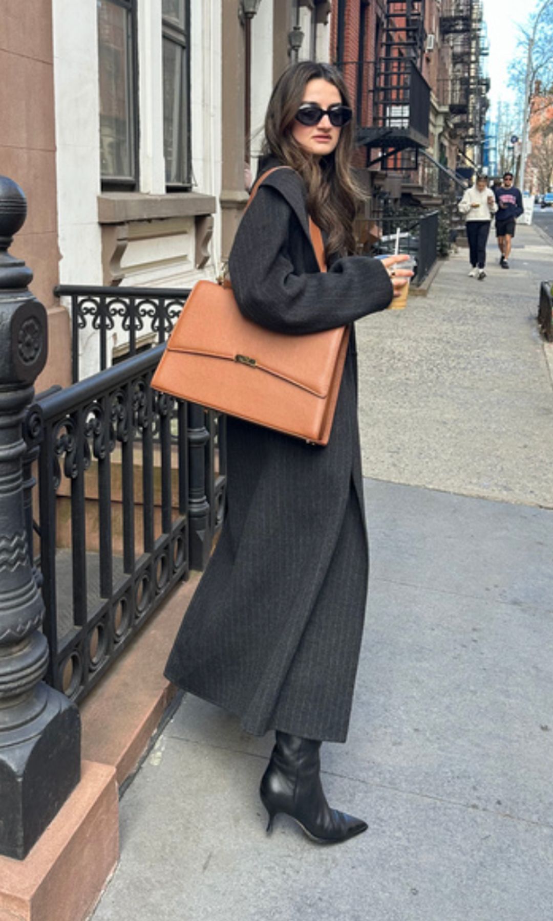 Persheng De Geer in black coat