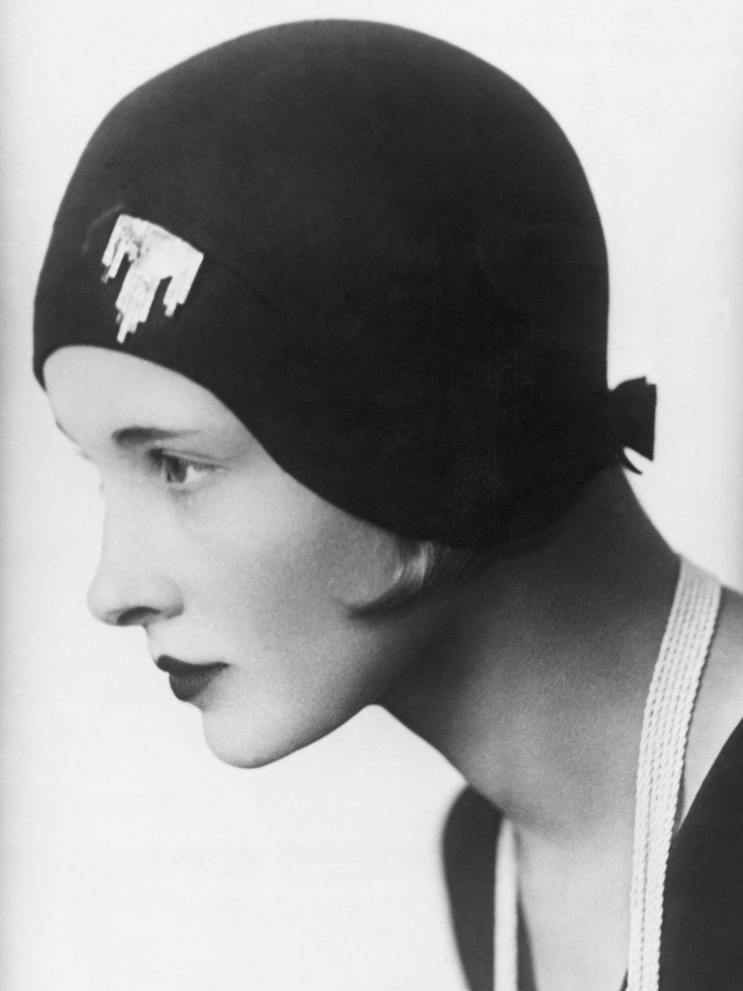 A model wearing a cloche hat 