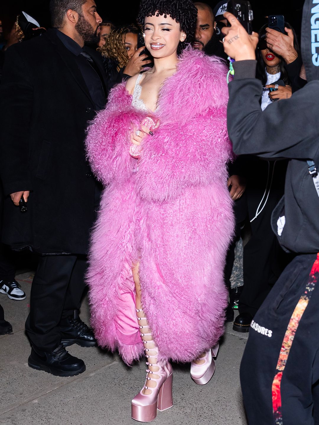 ice spice in pink coat