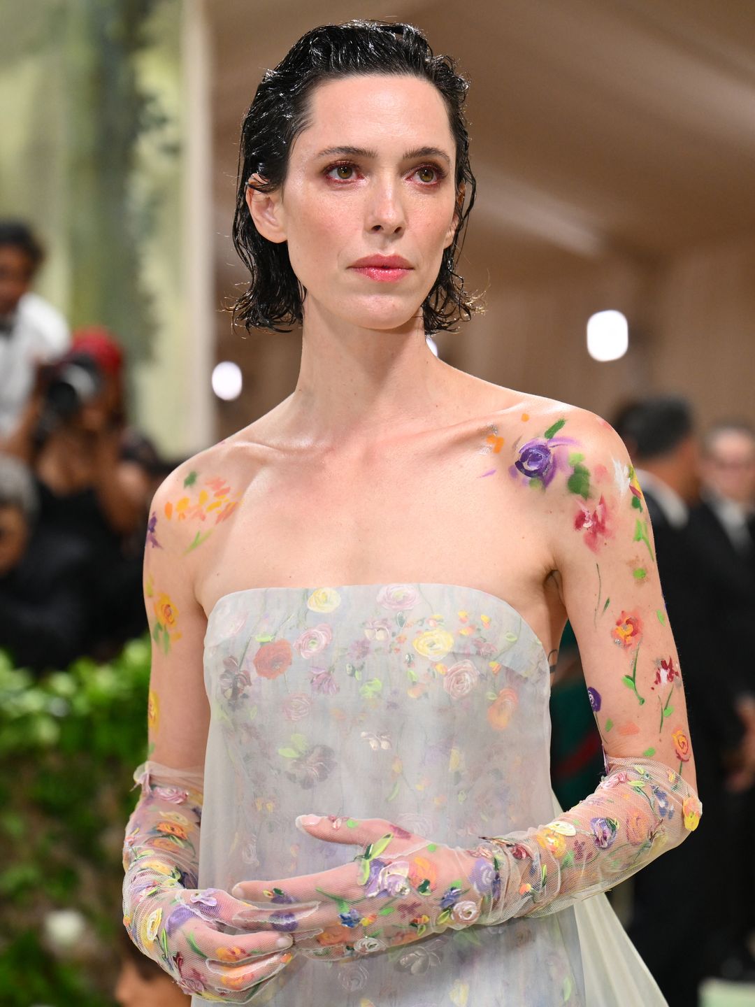 Rebecca Hall with painted floral body art at the Met Gala 