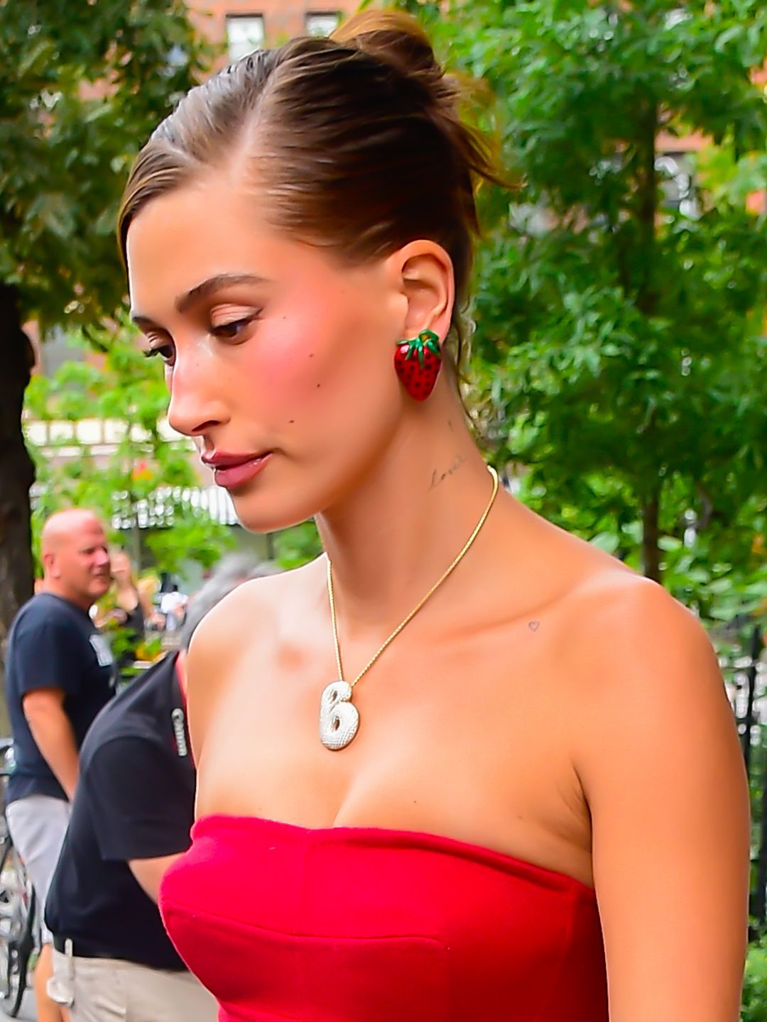 Hailey wore strawberry earrings to match her new hair colour