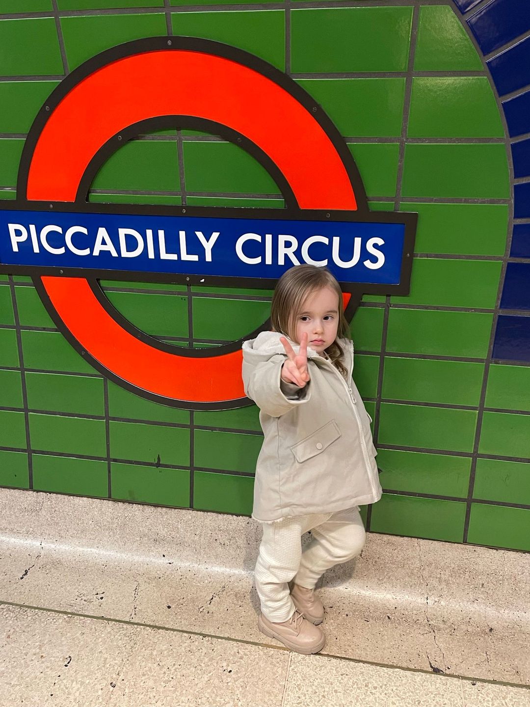 Ella Jordan poses at Piccadilly tube station
