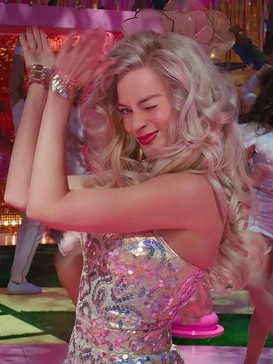 Margot Robbie dressed as disco Barbie at her party in Barbie Land