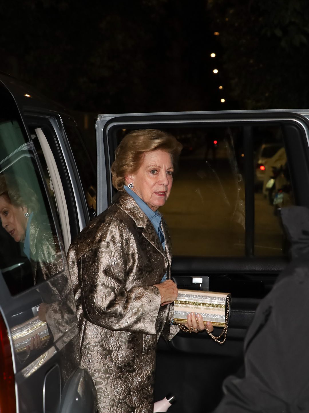 Queen Anne-Marie getting out of a car