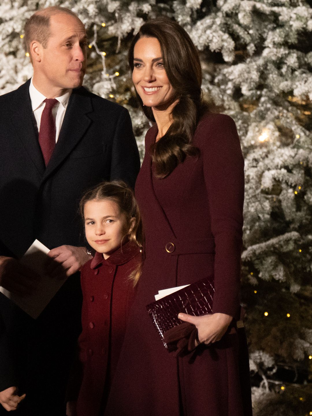 Prince William, Prince of Wales, Princess Charlotte of Wales and Catherine, Princess of Wales attend the 'Together at Christmas' Carol Service