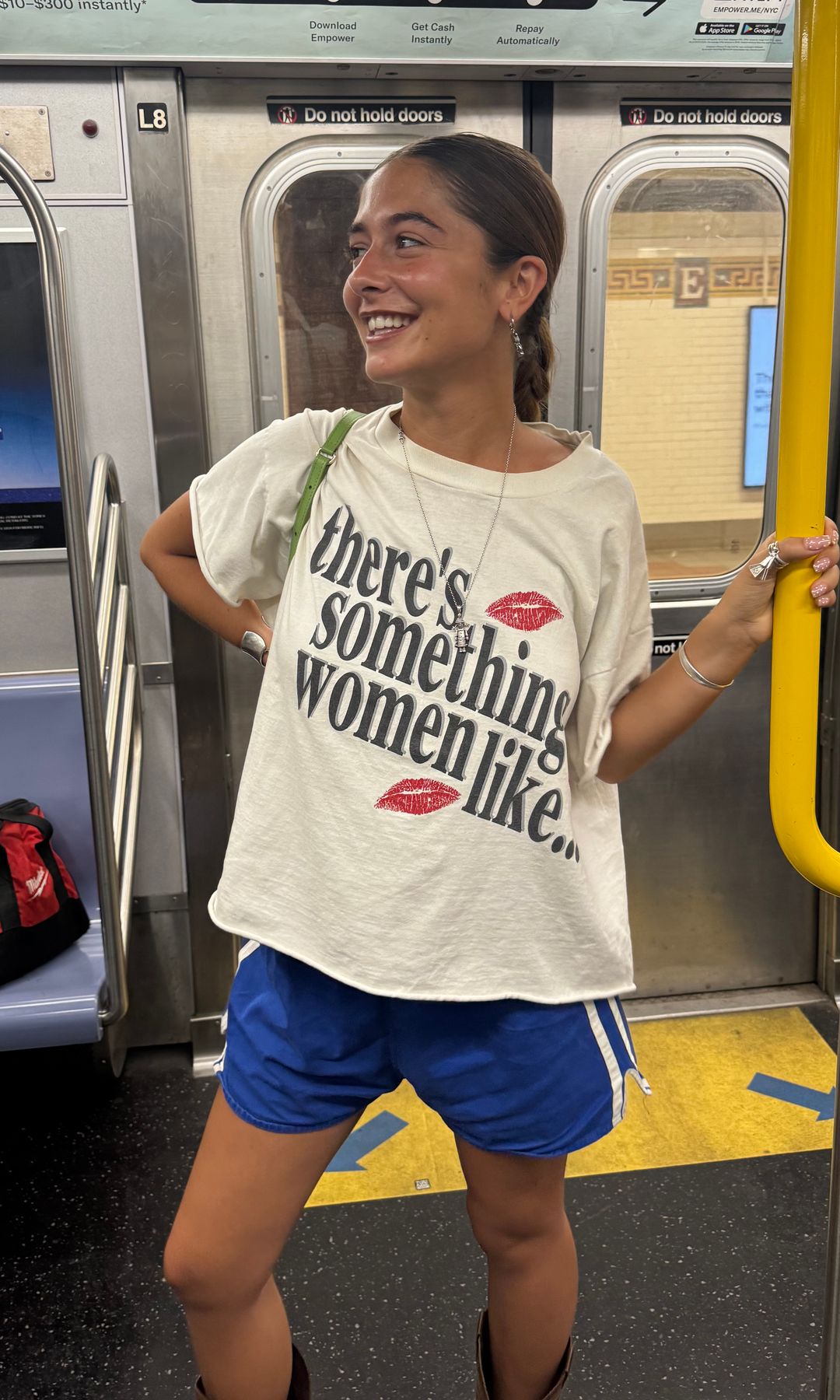 Izadora Hodges in T-shirt and boots