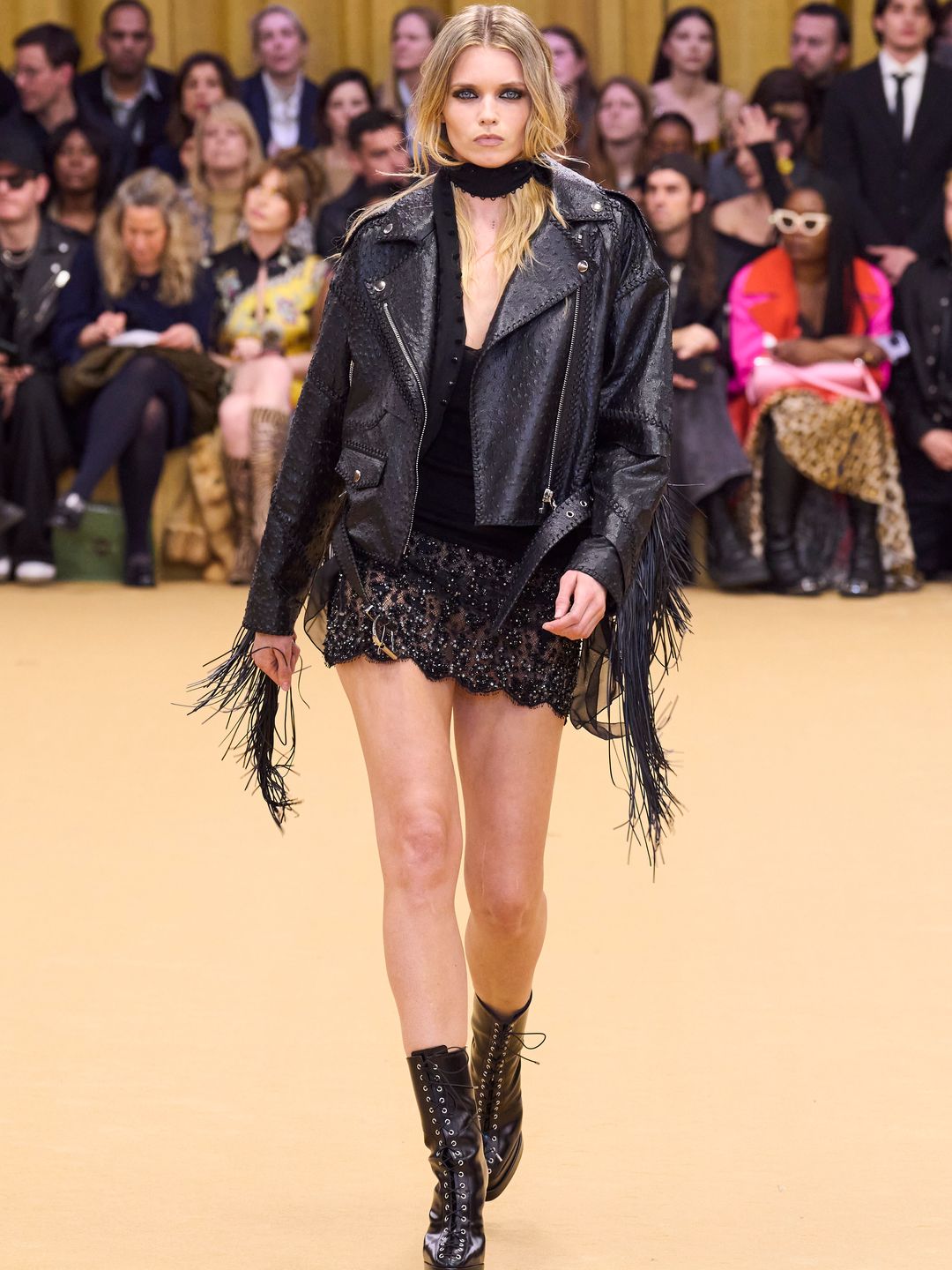 Roberto Cavalli model wearing black lace-up boots 
