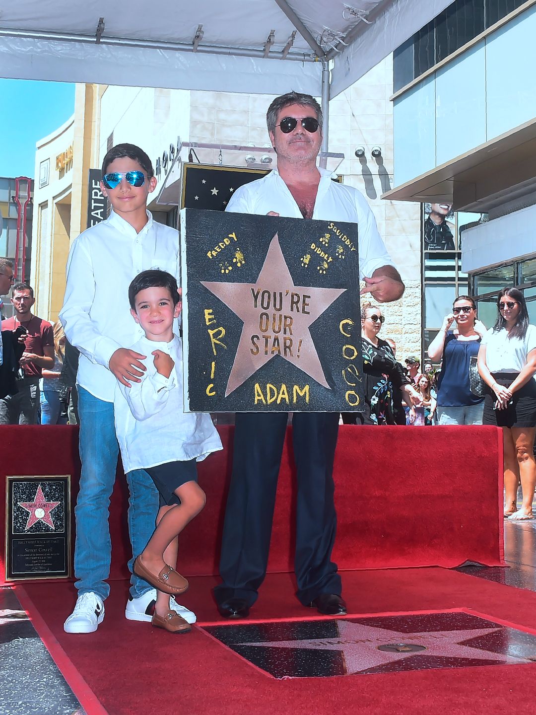 Simon Cowell with son Eric and stepson Adam