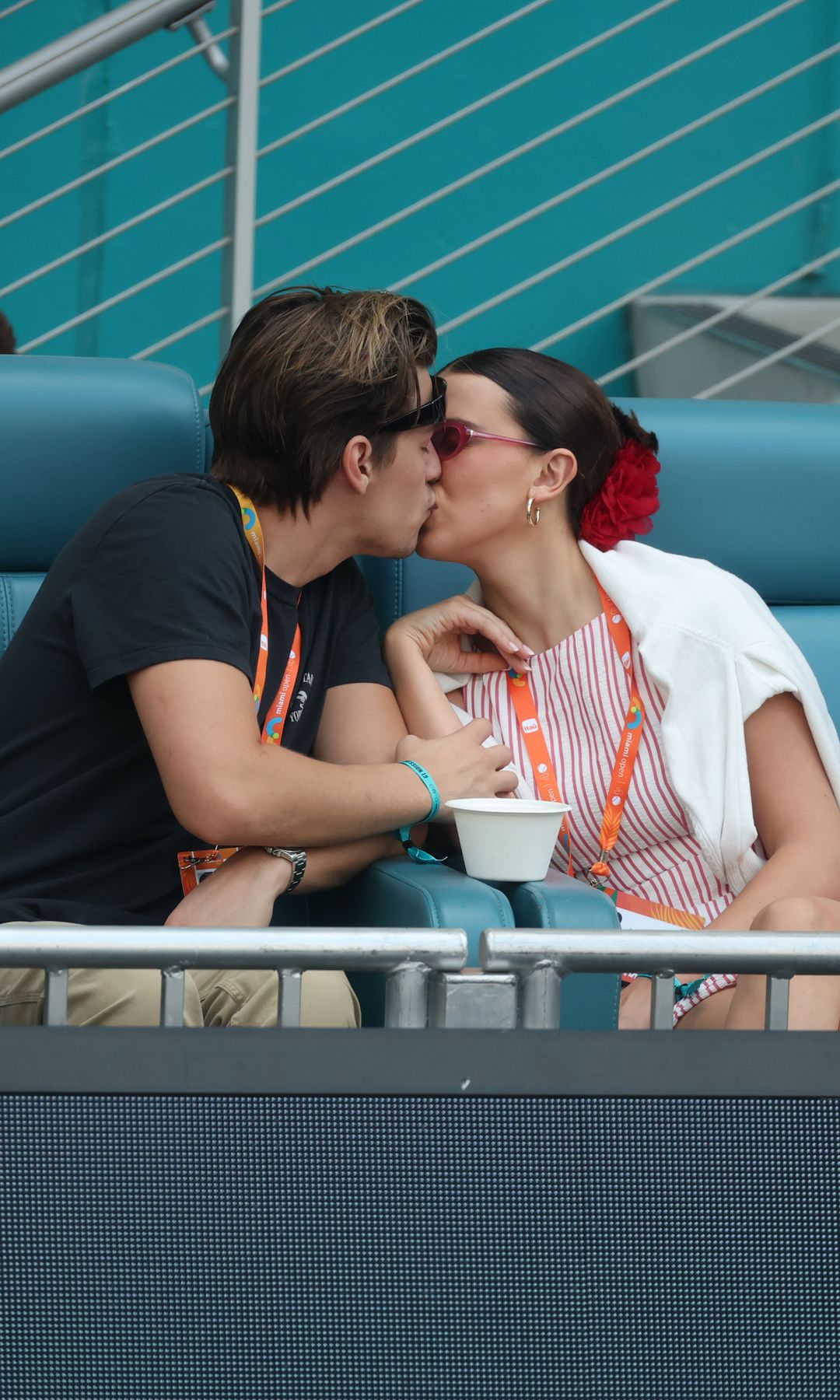 Jake Bongiovi and Millie Bobby Brown Bongiovi are seen during the Miami Open at Hard Rock Stadium on March 27